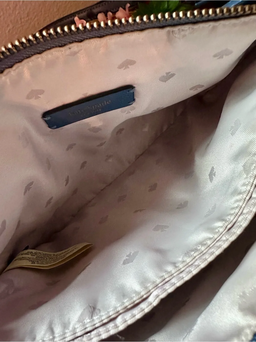 Kate Spade navy blue leather crossbody bag with adjustable strap